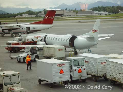 St. Paul Island, Alaska, 2002 ~ David Cary. Our plane is the little one in the foreground.
